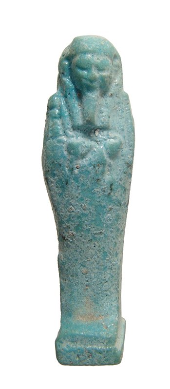 Attractive miniature Egyptian light blue glazed ushabti: An attractive miniature Egyptian light blue glazed ushabti, Late Period, c. 664 - 30 BC, mummiform, on integral base, wearing tripartite wig with false beard, arms folded at chest and hands holding a 