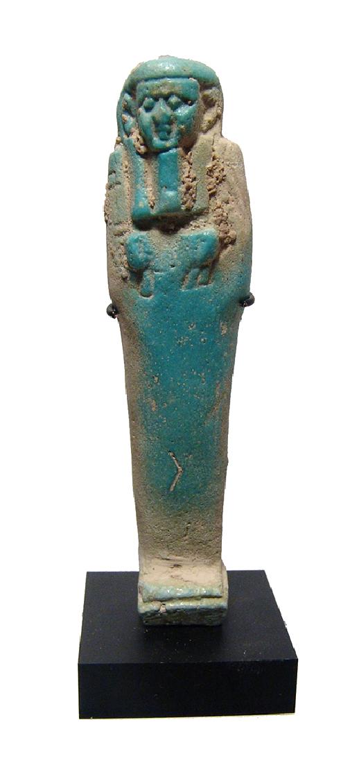 An Egyptian light blue faience ushabti (1 of 4)