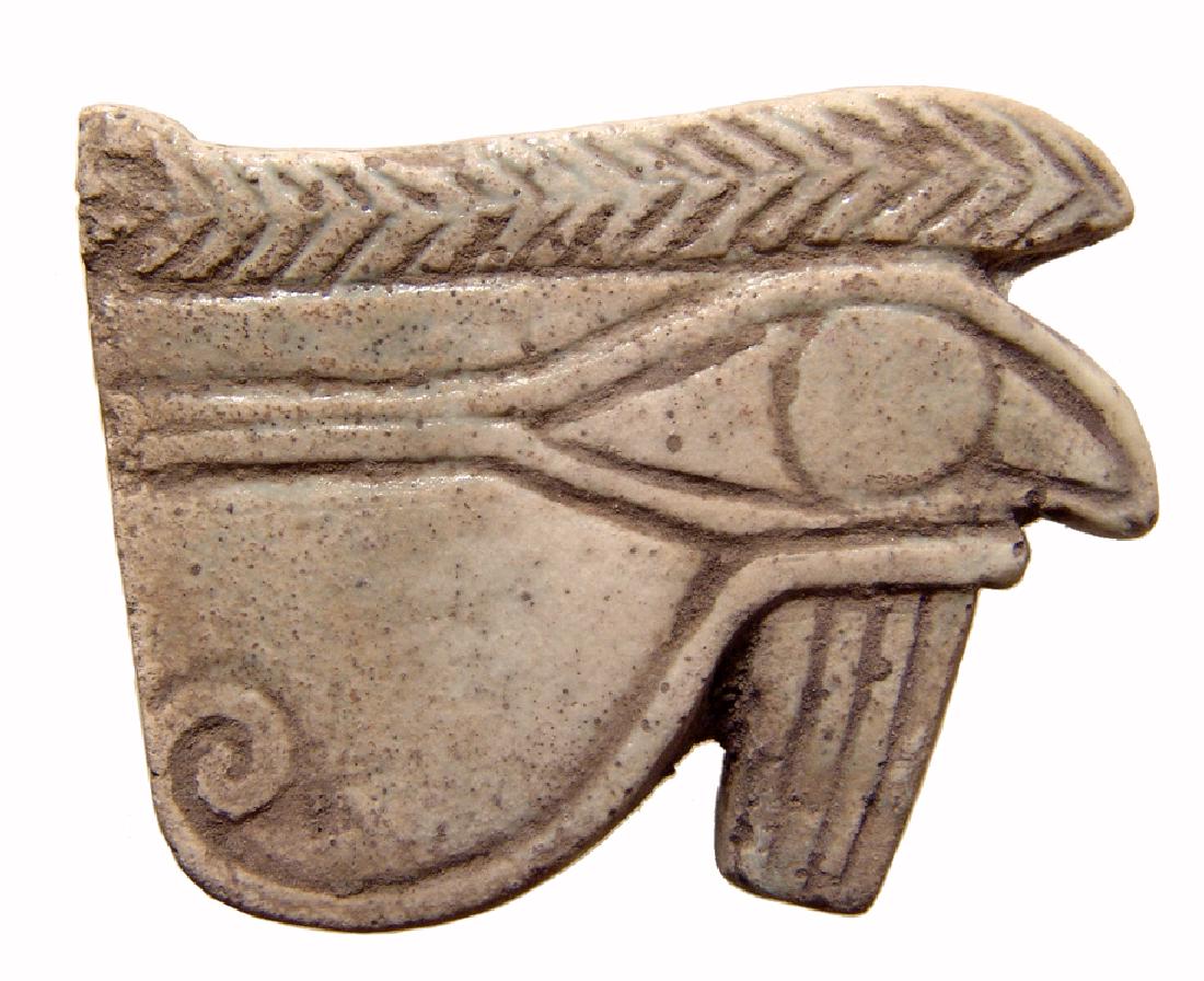 Egyptian faience 'Eye of Horus' amulet, Late Period (1 of 3)