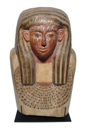 A stunning upper portion of an Egyptian sarcophagus lid