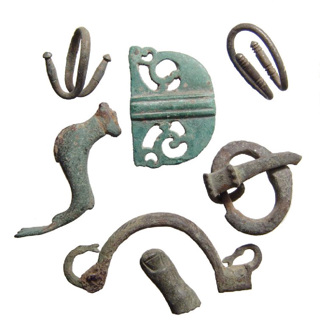 A mixed group of Roman silver and bronze items (1 of 3)