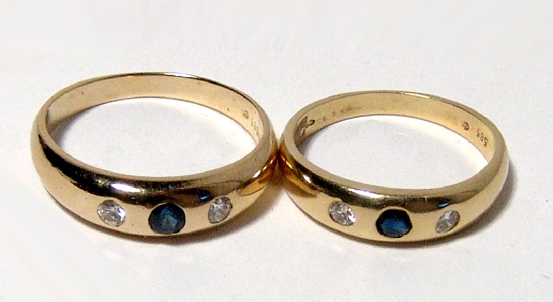 A pair of 14k Gold rings with diamonds and sapphires (1 of 4)
