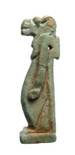 Large Egyptian green-glazed faience amulet of Taweret: A large Egyptian green-glazed faience amulet of Taweret, Late Period, c. 664 - 30 BC, the protective goddess of childbirth and fertility, depicted as a bipedal hippopotamus with leonine limbs. H: 1