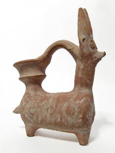 Near Eastern terracotta rhyton in form of horned animal: A Near Eastern terracotta rhyton in the form of a horned animal, c. 1000 - 600 BC, likely a bull, with barrel shaped body and spouted mouth, the legs are short and tapered and the mouth sits above