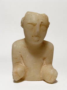 A Sabaean marble head and torso of a youth: A Sabaean marble head and torso of a youth, South Arabia, c. 3rd - 1st Century BC, possessing large eyes and nose, his elbows at his side, fists clenched forward. H: 7 ¼ in (18.4 cm). Nice mineral