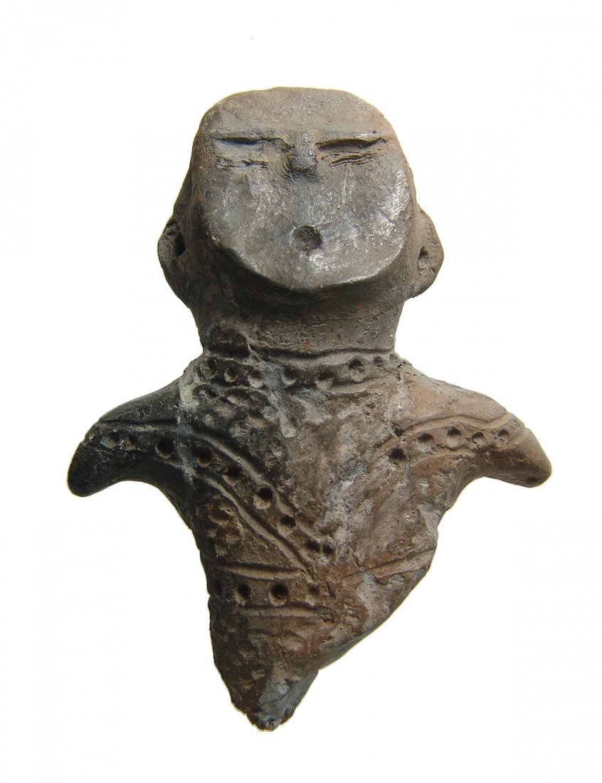 A Jomon ceramic effigy figure, Japan (1 of 3)