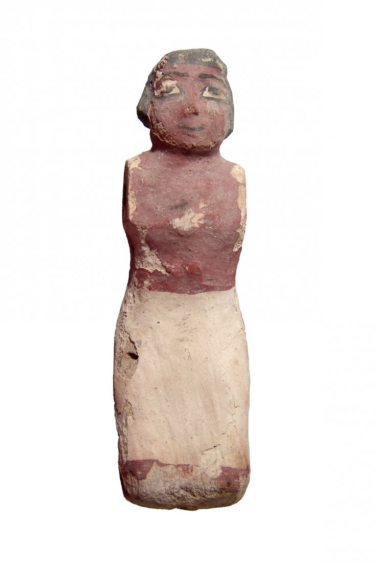 A large Egyptian wooden figure, Middle Kingdom (1 of 3)