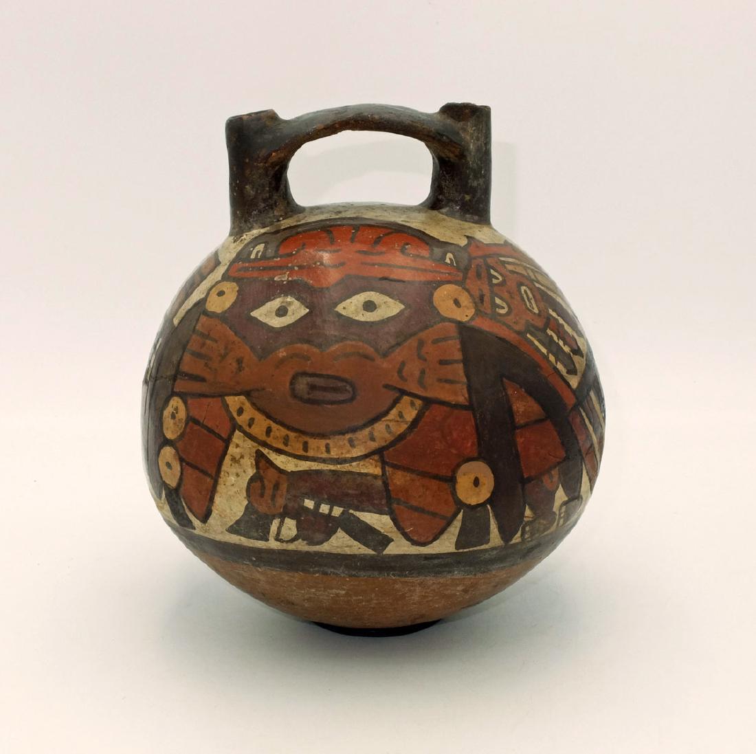 A fine Nazca polychrome vessel w/ the Spotted Cat (1 of 3)