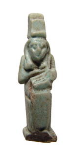 Egyptian faience amulet depicting Isis and Horus: An Egyptian green-glazed faience amulet depicting Isis with the child Horus, Late Period, c. 664 - 30 BC, nicely detailed seated on her throne surmounted by her symbol which is a throne. H: 1 in