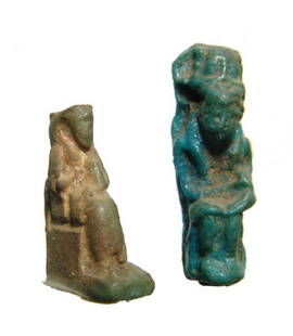 A pair of Egyptian faience amulets of Isis and Horus: A pair of Egyptian faience amulets of Isis and Horus. The first is a green faience amulet of seated Isis, Late Period, c. 664 - 30 BC, who suckles the infant Horus who sits in her lap, H: 22 mm, the