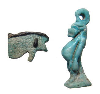 A nice pair of Egyptian faience amulets: A nice pair of Egyptian faience amulets. Lot includes a nice light blue faience amulet of Taweret, Late Period, c. 664 - 30 BC, the goddess of pregnancy and childbirth depicted as a standing pregnant