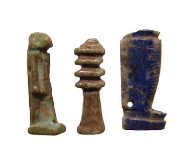 A group of 3 Egyptian stone and faience amulets: A group of 3 Egyptian stone and faience amulets, Late Period, c. 664 - 30 BC, including a green faience Djed pillar, a green faience amulet of Khnum, and lower half of a Lapis Lazuli amulet. Largest