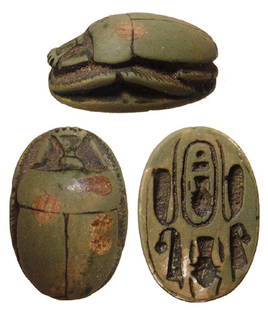 Egyptian glazed steatite scarab, New Kingdom: An Egyptian glazed steatite scarab, New Kingdom, c. 1570 - 1075 BC, with well-preserved green glaze, the body and legs well-carved, on base a cartouche containing the praenomen of pharaoh Thutmose