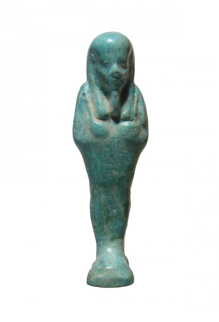 A light blue Egyptian faience ushabti, Late Period (1 of 3)