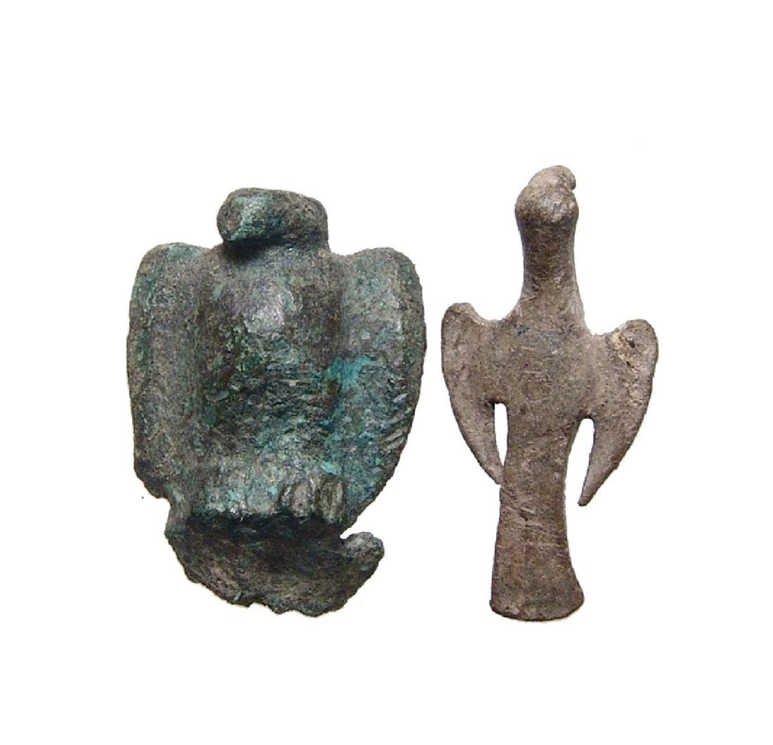 A pair of ancient bronze and silver bird elements (1 of 3)