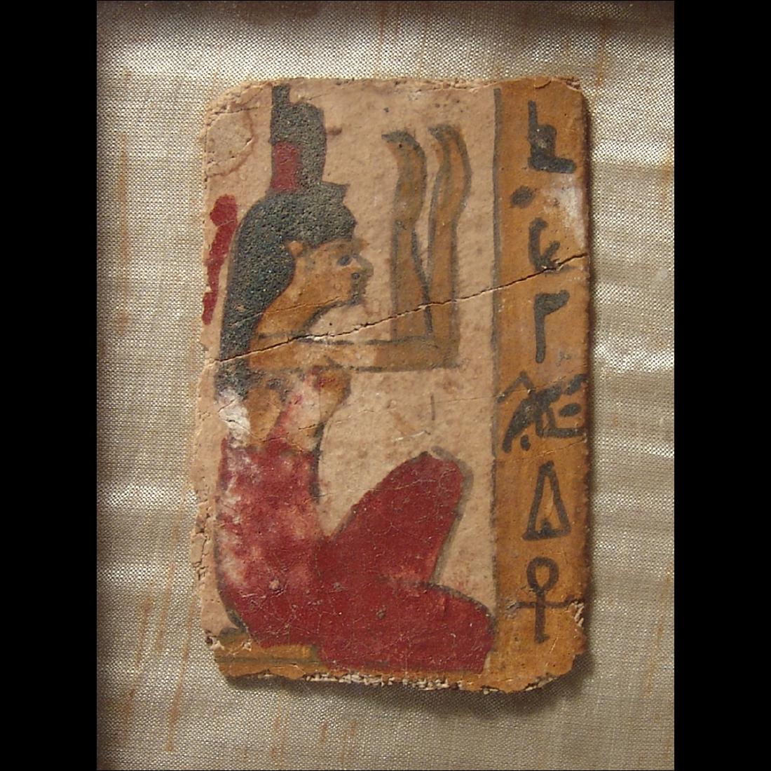 Cute Egyptian painted cartonnage panel depicting Isis: A cute Egyptian painted cartonnage panel depicting Isis, Late Period, c. 664 - 30 BC, beautifully colored, the goddess wearing her throne headdress, both hands in adoration before. In a column before 