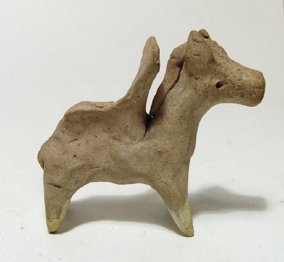 A Near Eastern terracotta horse with a saddle for rider (1 of 4)