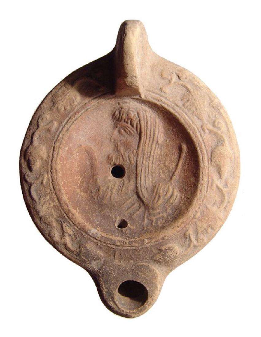 Roman ceramic lamp depicting the bust of a priest (1 of 3)