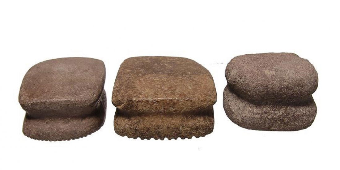 A group of three Mayan stone bark beaters (1 of 3)