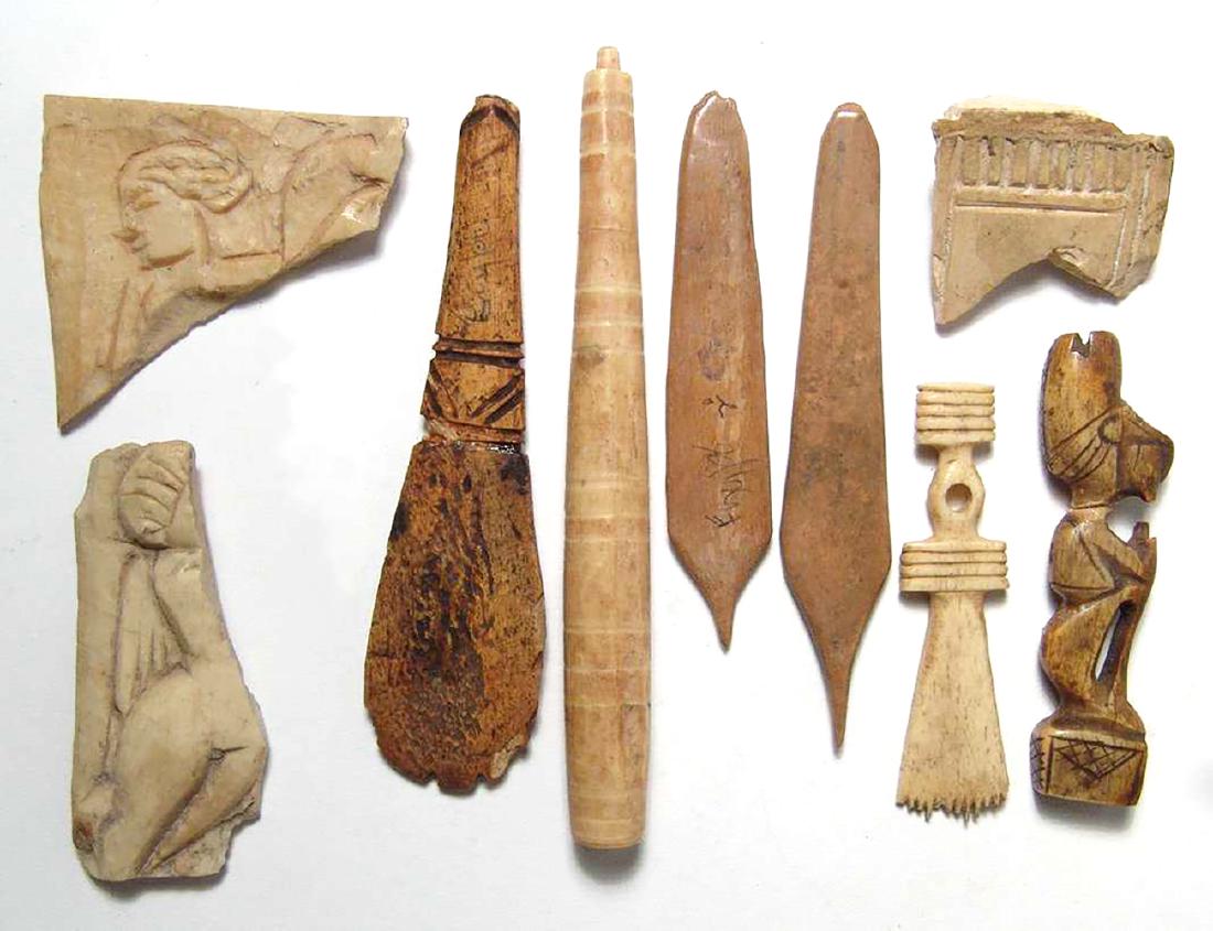 Collection of Roman and Coptic bone tools & fragments: A collection of Roman and Coptic bone tools and fragments. Lot includes three Roman bone furniture inlays, c. 1st - 5th Century AD, as well the handle to an implement, part of a spoon, two tools, a de
