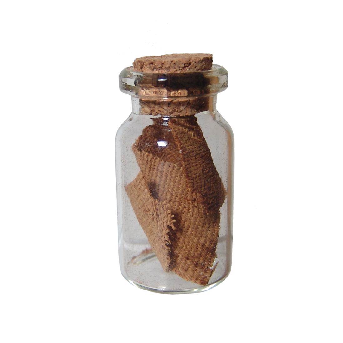 A bottle of mummy-wrappings dating, 3rd Intermediate: A bottle of mummy-wrappings dating from Egypt's 3rd Intermediate Period c. 900-700 BC. Tan to brown color, recovered from a sarcophagus owned by BC Antiques, Los Angeles. Bottle H: 4 cm (1 5/8 in).