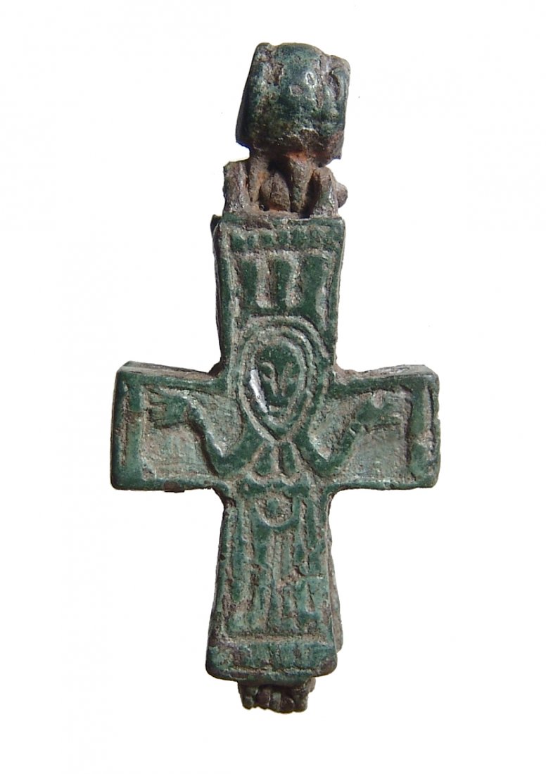 A beautiful Byzantine bronze reliquary cross: A beautiful Byzantine bronze reliquary cross, c. 9th - 12th Century AD, comprised of two halves with a suspension loop, one side depicts the crucified Christ, cross above, and the opposite side depict