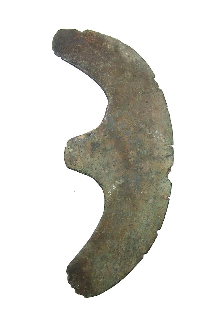 A Near Eastern bronze crescent axe head (1 of 2)