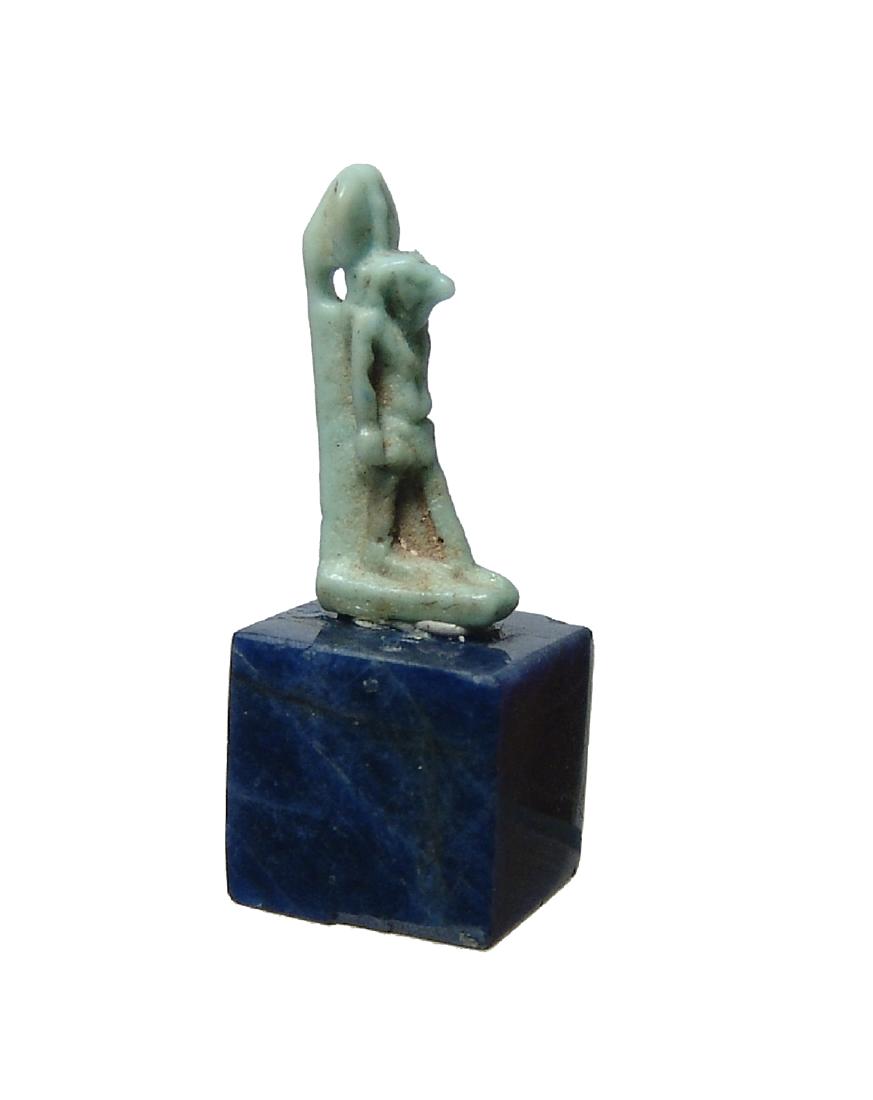 A detailed Egyptian faience amulet of Horus (1 of 4)