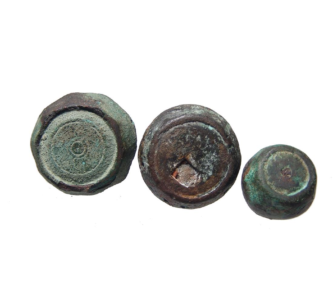 A trio of 3 Roman heavy bronze weights (1 of 3)