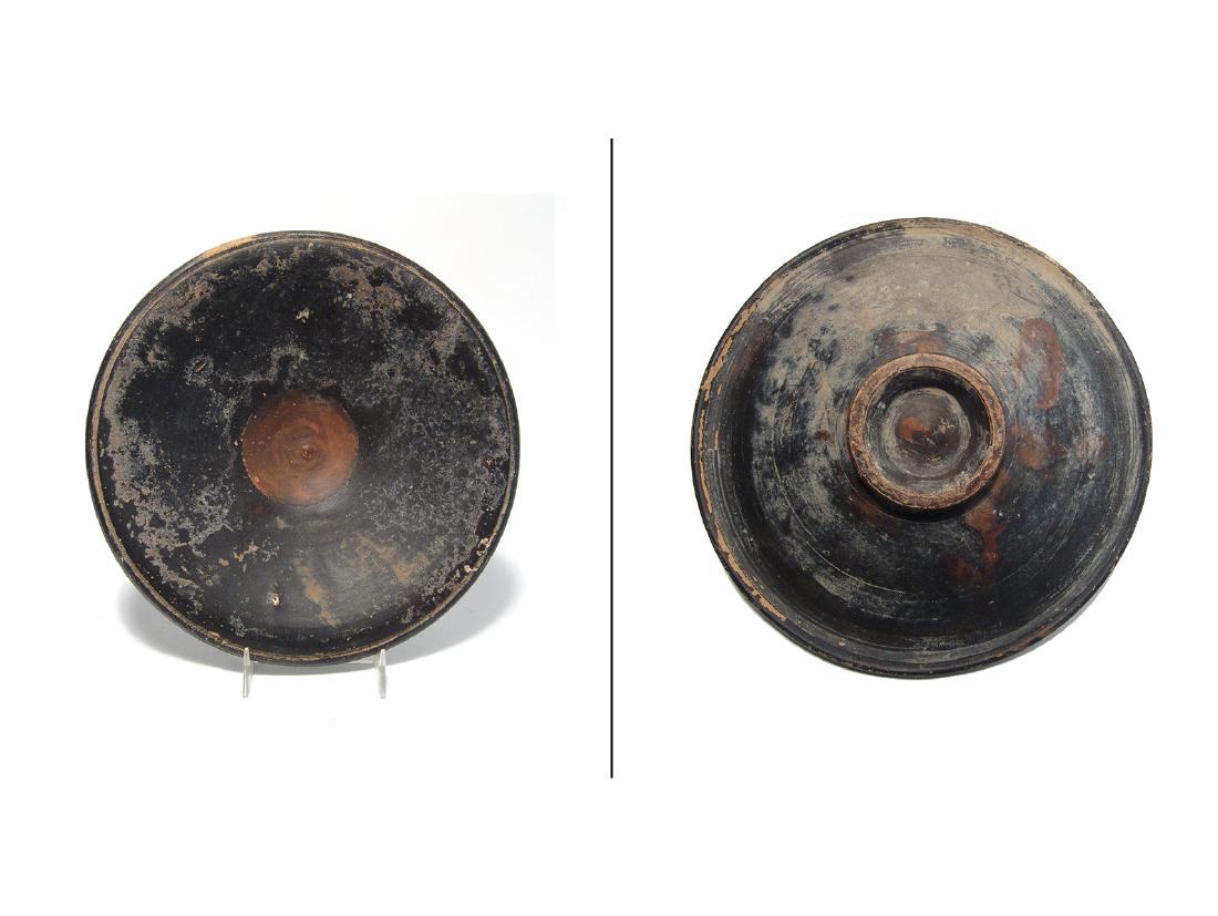 A Greek black-glazed plate shallow bowl or plate (1 of 3)