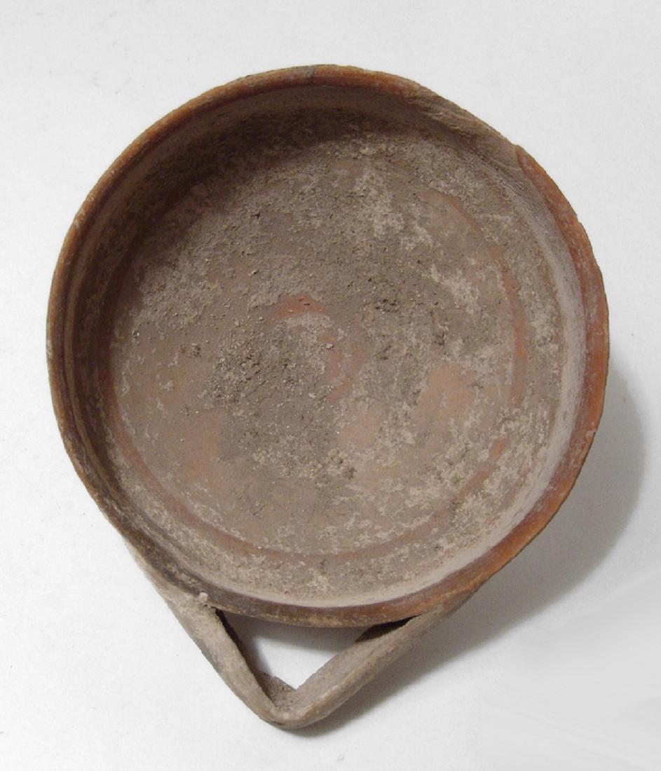 A Daunian cup with a small triangular handle (1 of 3)