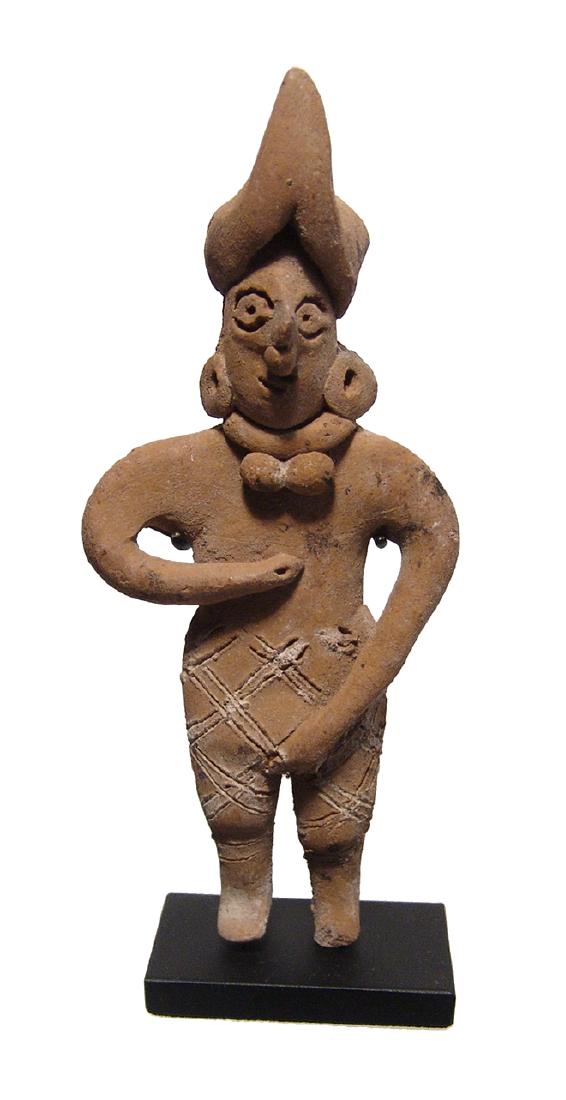 A very nice Colima figure of a male with incised pants (1 of 4)