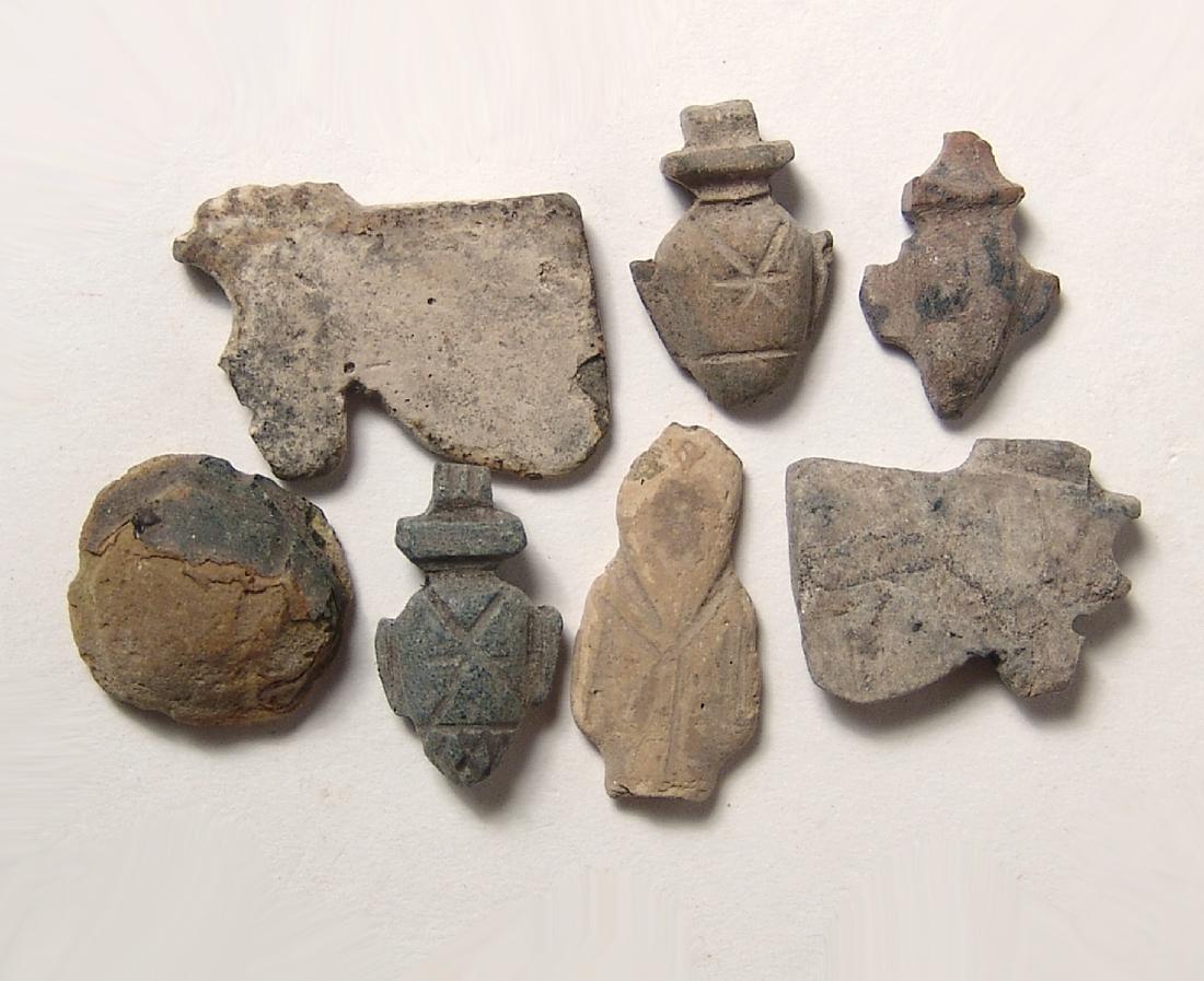 A group of 7 Egyptian stone amulets, Late period (1 of 1)