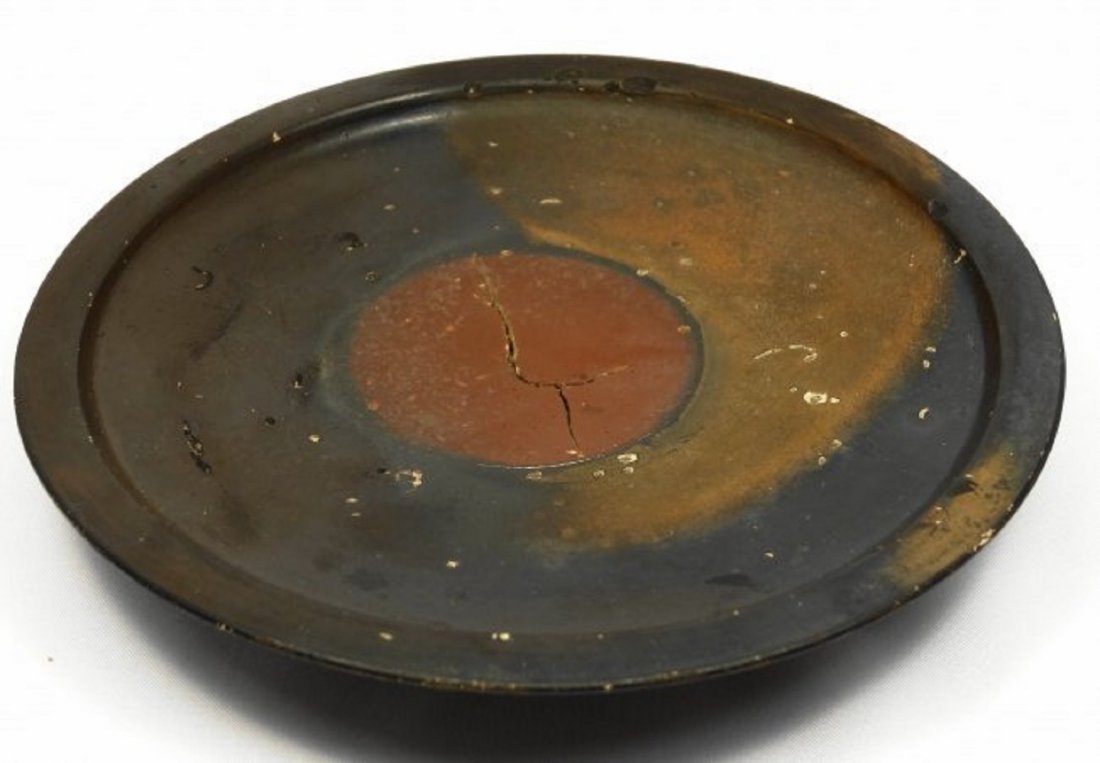 A Greek black glazed footed plate (1 of 2)