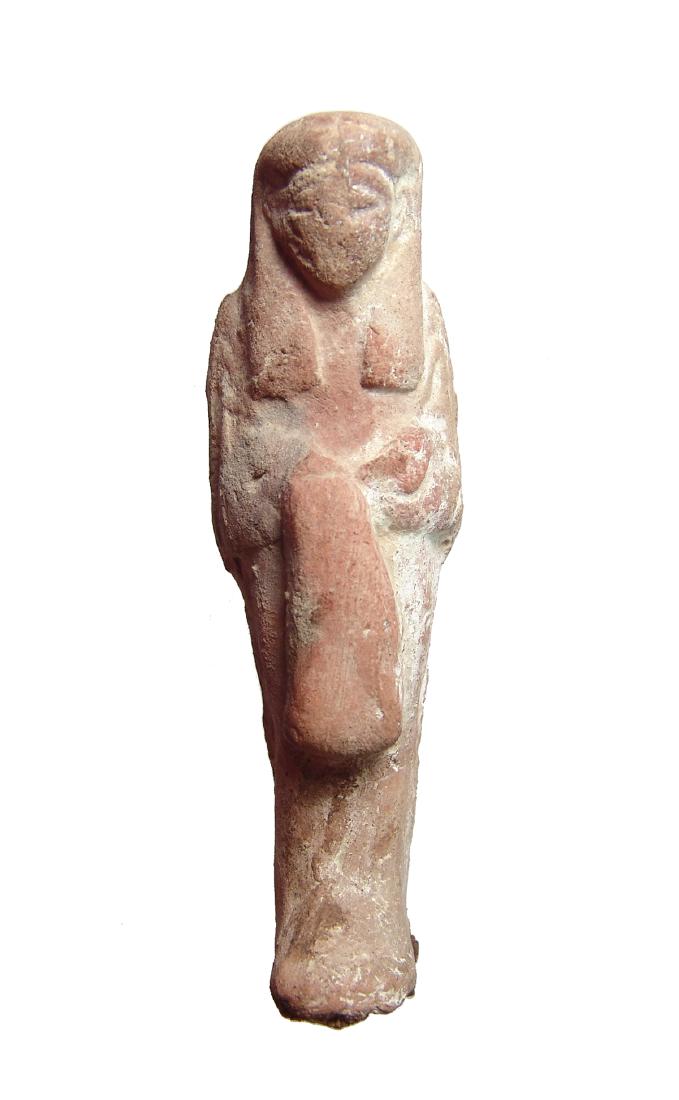 Egyptian terracotta reis ushabti, 3rd Intermediate: An Egyptian terracotta reis ushabti, 3rd Intermediate Period, c. 1075 - 664 BC, depicted mummiform with apron of daily life and tripartite wig, arms folded at chest, hands holding a pick and hoe. H: 4
