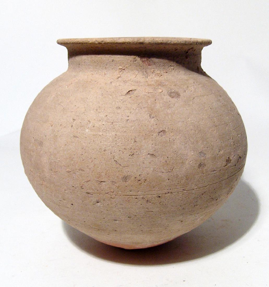 An elegant ovoid jar from the Holy Land: An elegant ovoid jar from the Holy Land, c. 800 - 500 BC, thin-walled with much eye appeal. H: 5 1/2 in (14 cm). Remnants of earthen deposits. Ex Las Vegas private collection.