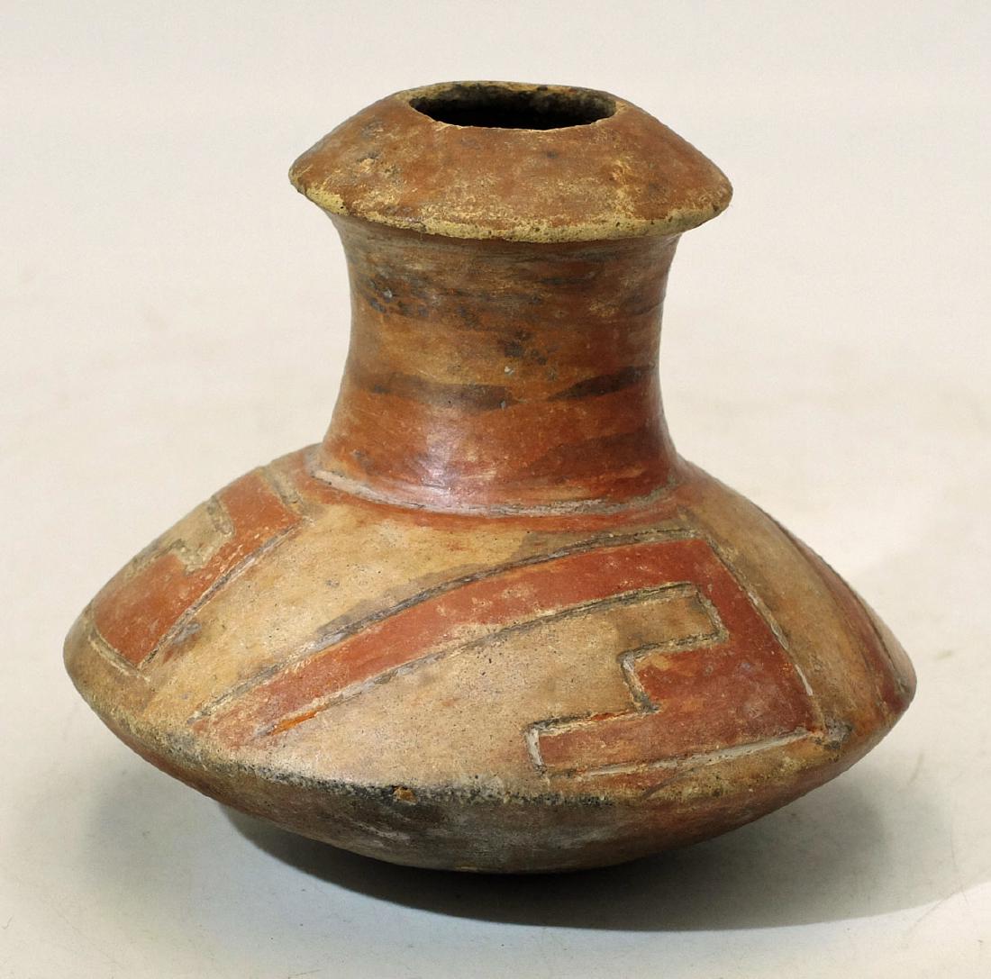 A choice Narino poporo from Colombia: A choice Narino poporo from Colombia, c. AD 750 - 1250, a choice Piartal cultural complex example which is lavishly decorated with stylized geometric designs. The incising is set off with vivid paint 