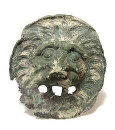 An attractive bronze facing lion head applique