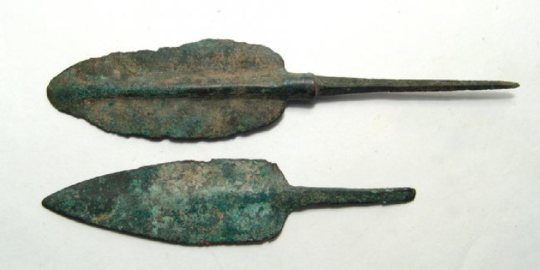 A pair of Near Eastern bronze spear points: A pair of Near Eastern bronze spear points, c. 1000 - 600 BC, both well-preserved with nice mottled green patina. Longest: 5 3/4 in (14.6cm). Ex Southern California private collection.