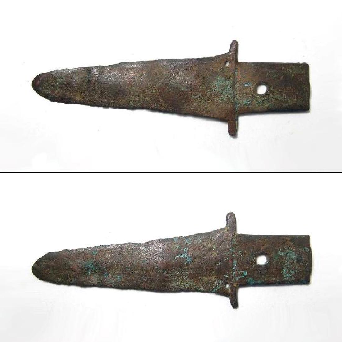 Chinese bronze ge (halberd), Shang - early Zhou: An attractive Chinese bronze ge (halberd), Shang - early Zhou, c. 1200 - 1000 BC, the tapered blade with hole near hilt' the tang substantial and rectangular with large fastening hole. L: 8 1/2 in (21