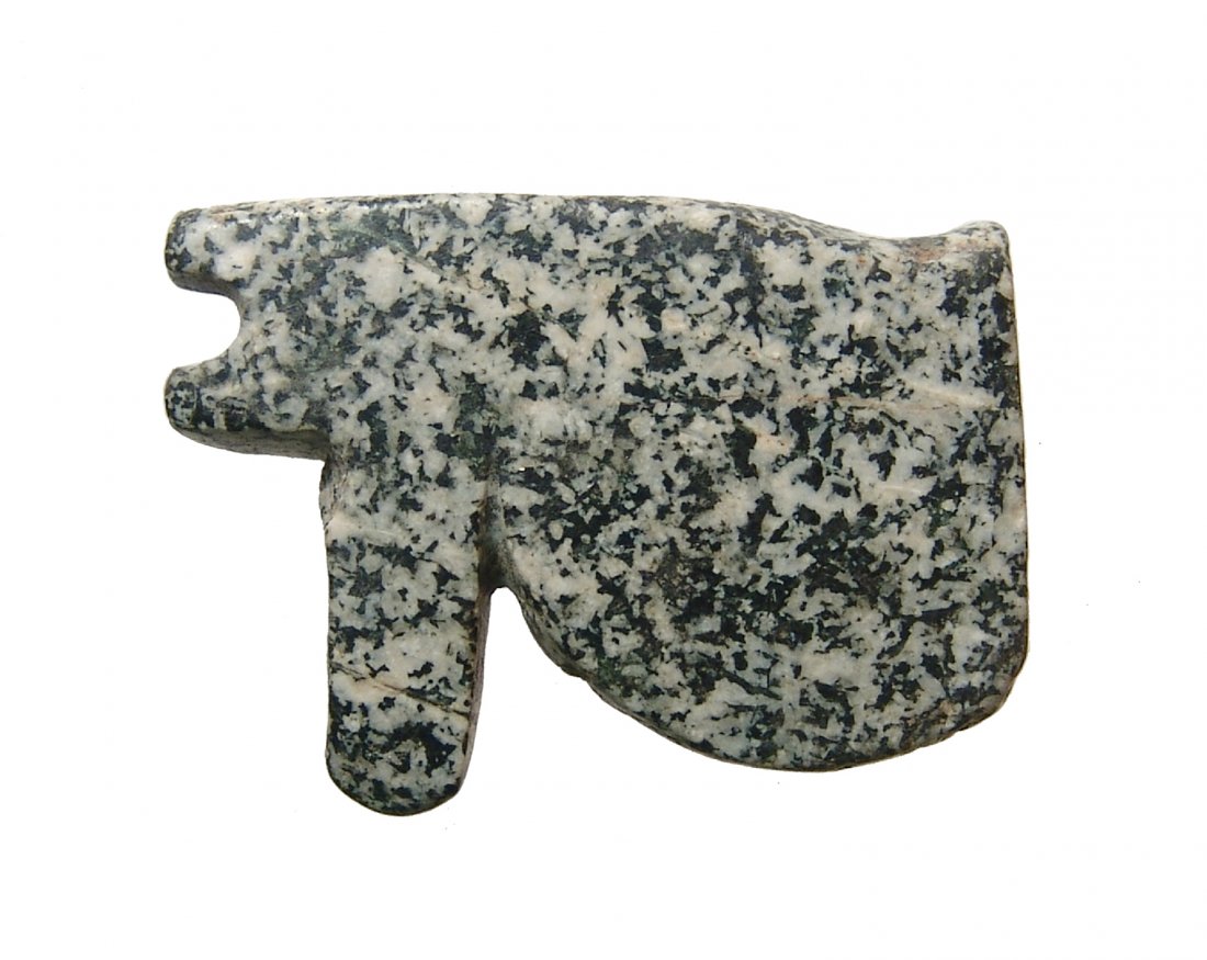 Large Egyptian diorite granite Eye of Horus amulet: A very large Egyptian diorite granite Eye of Horus amulet, 3rd Intermediate period, c. 1075 - 664 BC, nicely shape in attractive speckled stone; drilled lengthwise for suspension. L: 2 in (5 cm), 10 m