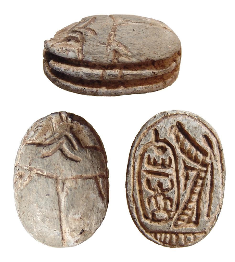 Egyptian steatite scarab with cartouche of Thutmose III: An Egyptian steatite scarab with cartouche of Thutmose III, New Kingdom, Dynasty 18, c. 1479 - 1292 BC, the head nicely carved and legs in the form of parallel grooves. On the base, winged deity with 