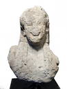 Fantastic, large Archaic Greek stone head of a Kouros