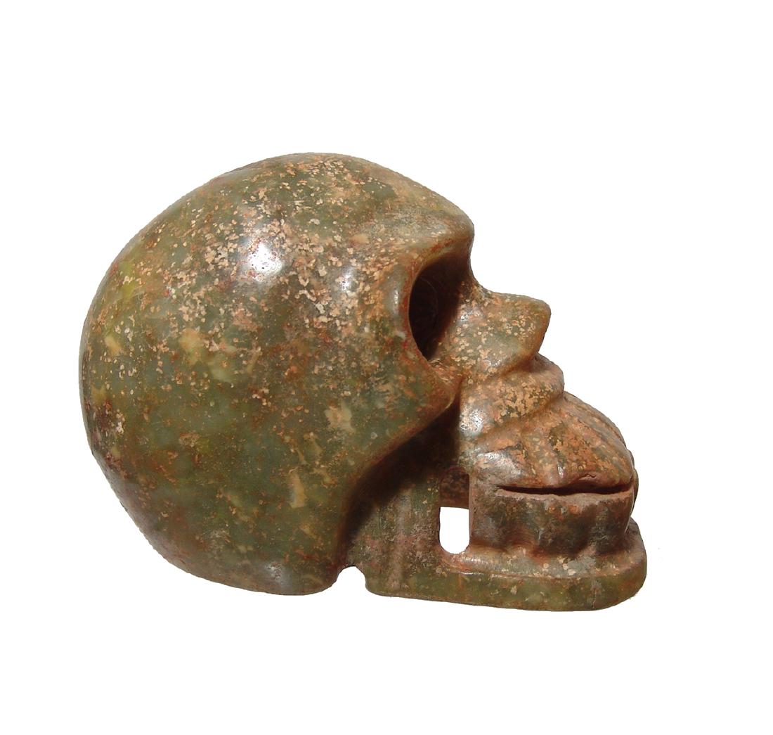 An amazing Pre-Columbian-style green stone skull: An amazing Pre-Columbian-style green stone skull, uncertain age. Nicely carved in the round with fine style. 5 7/8 x 4 x 3 3/4 in (14.8 x 10.2 x 9.5 cm). An impressive display piece!