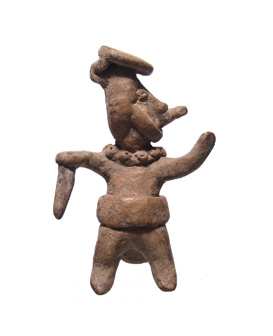 A cute Colima standing dancer in costume: A cute Colima standing dancer in costume, West Mexico, c. 100 BC - AD 200, wearing an elaborate head with chin strap, beaded necklace and nose labret, a wide girdle is around his waist with tassels at