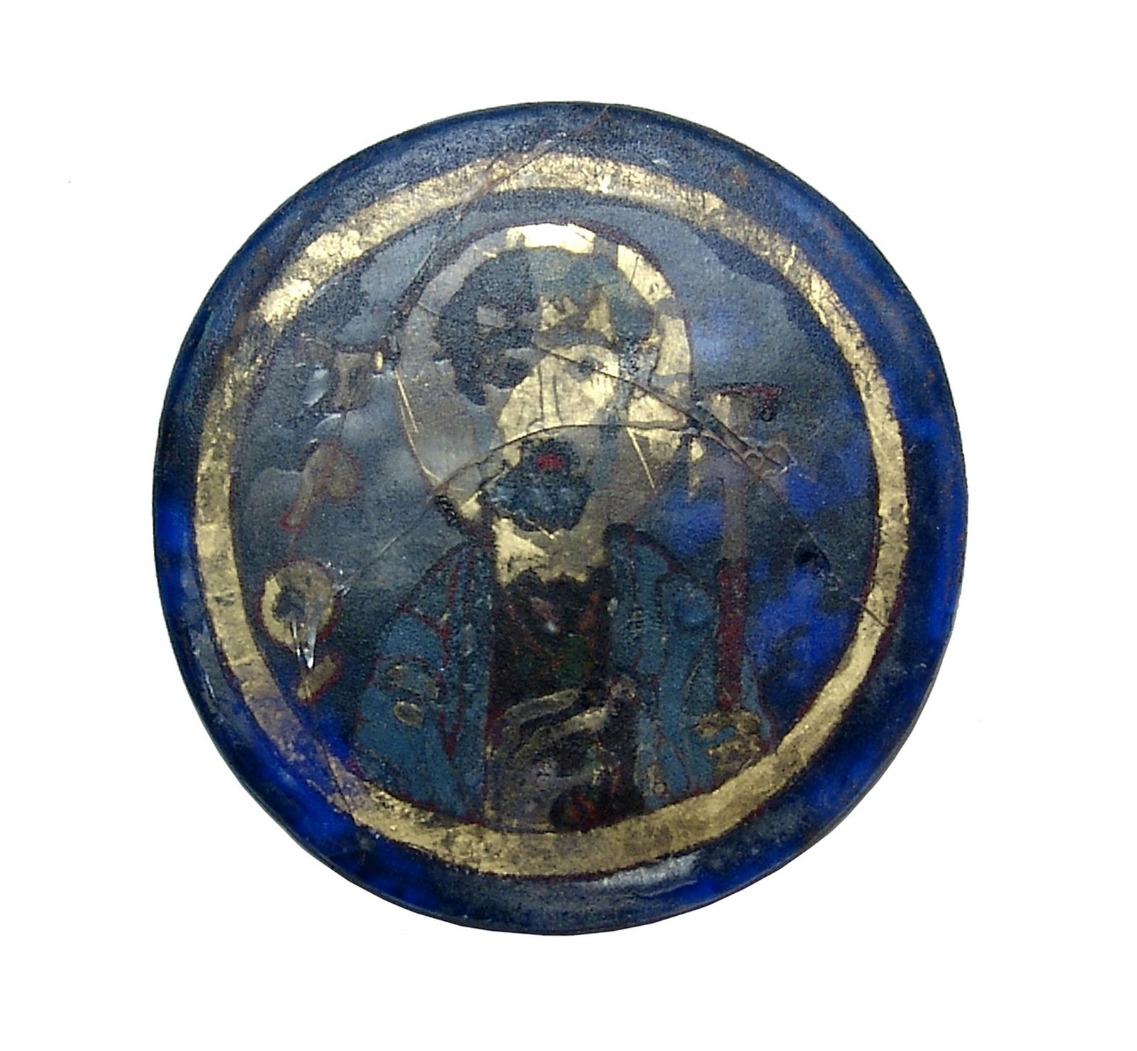Beautiful Byzantine glass medallion depicting a saint: A beautiful Byzantine gold and blue glass medallion depicting a saint, c. 6th - 7th Century AD, nimbate, holding a sceptre tipped by a cross. Nicely detailed with the image encased within the center o