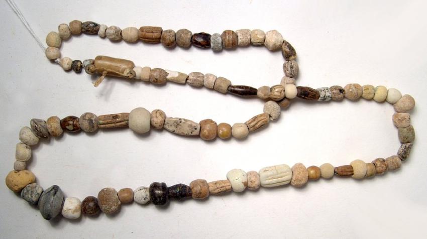 A mixed strand of ancient stone and glass beads (1 of 2)
