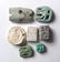 A group of 7 Egyptian faience plaques and beads