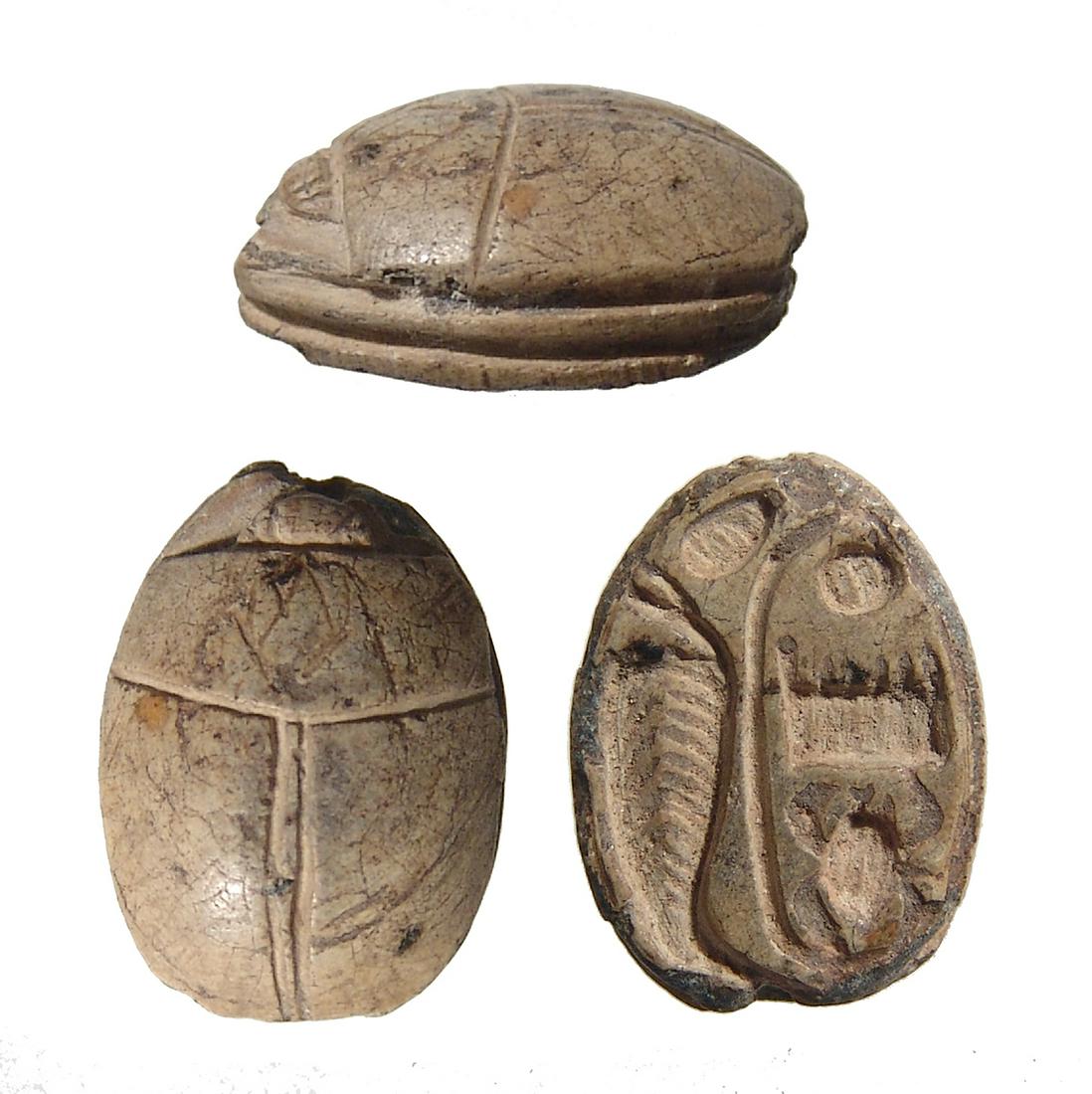 Egyptian steatite scarab with name of Thutmose III: An Egyptian steatite scarab with name of Thutmose III, 3rd Intermediate Period, c. 1075 - 664 BC, with nicely carved body and grooved legs. On base an amuletic cartouche of Thutmose III 'Men-Kheper-Ra