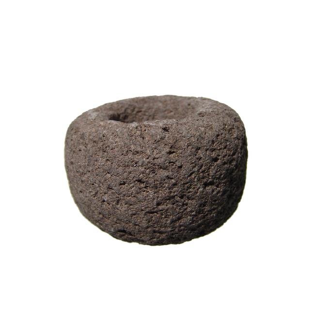 A large Nicoya basalt mace head, Costa Rica: A large Nicoya basalt mace head, Costa Rica, c. AD 100 - 500, with large central shaft hole. 3 1/2 x 2 3/8 in (8.9 x 6.2 cm). Mineral deposits throughout. Ex Costa-Mejia collection.